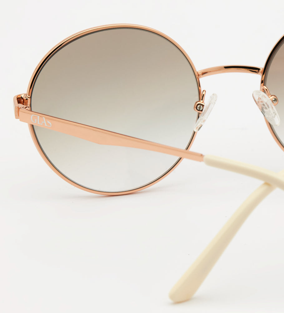 Læsebrille med solbeskyttelse model Grace i rose gold